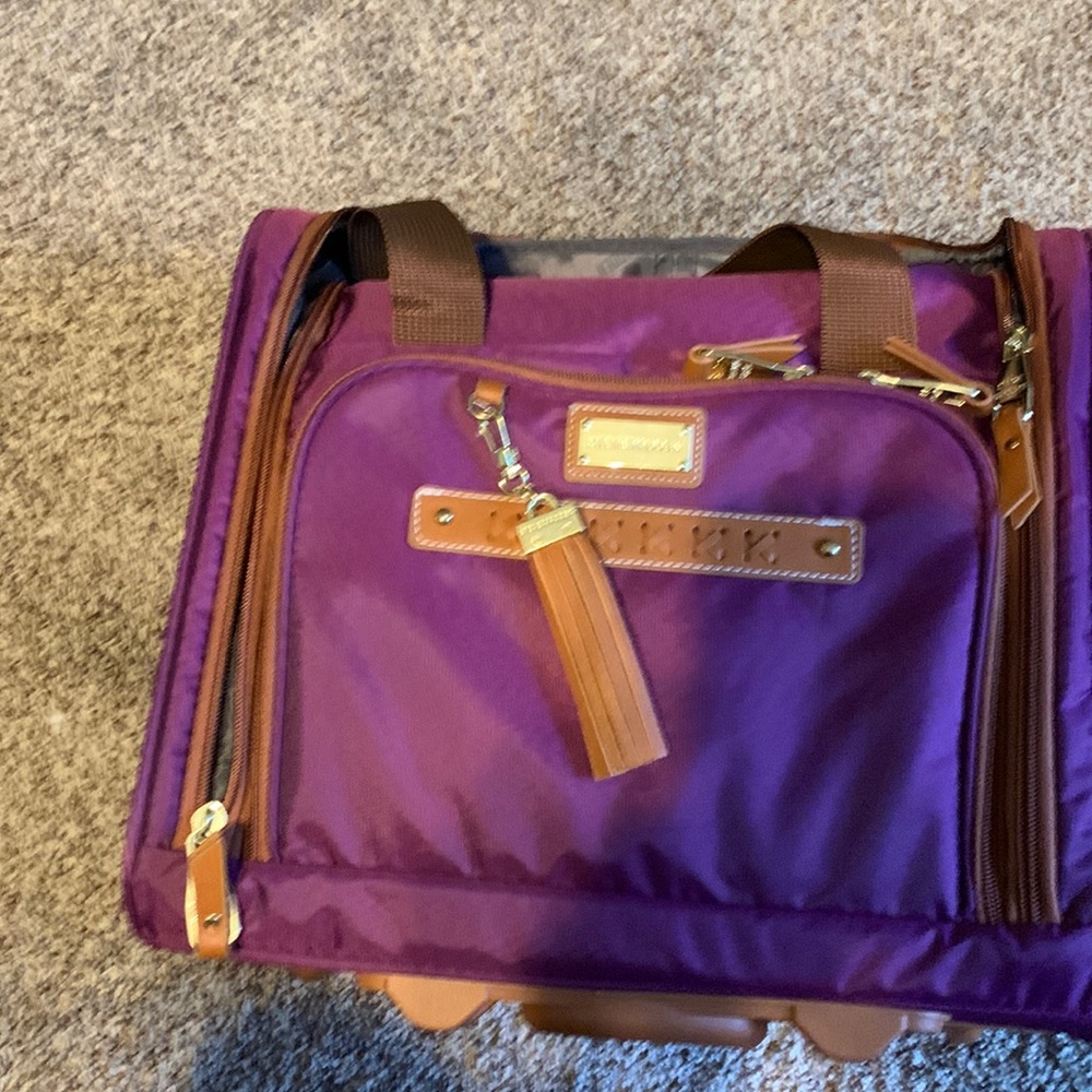 Steve Madden brand new rolling bag